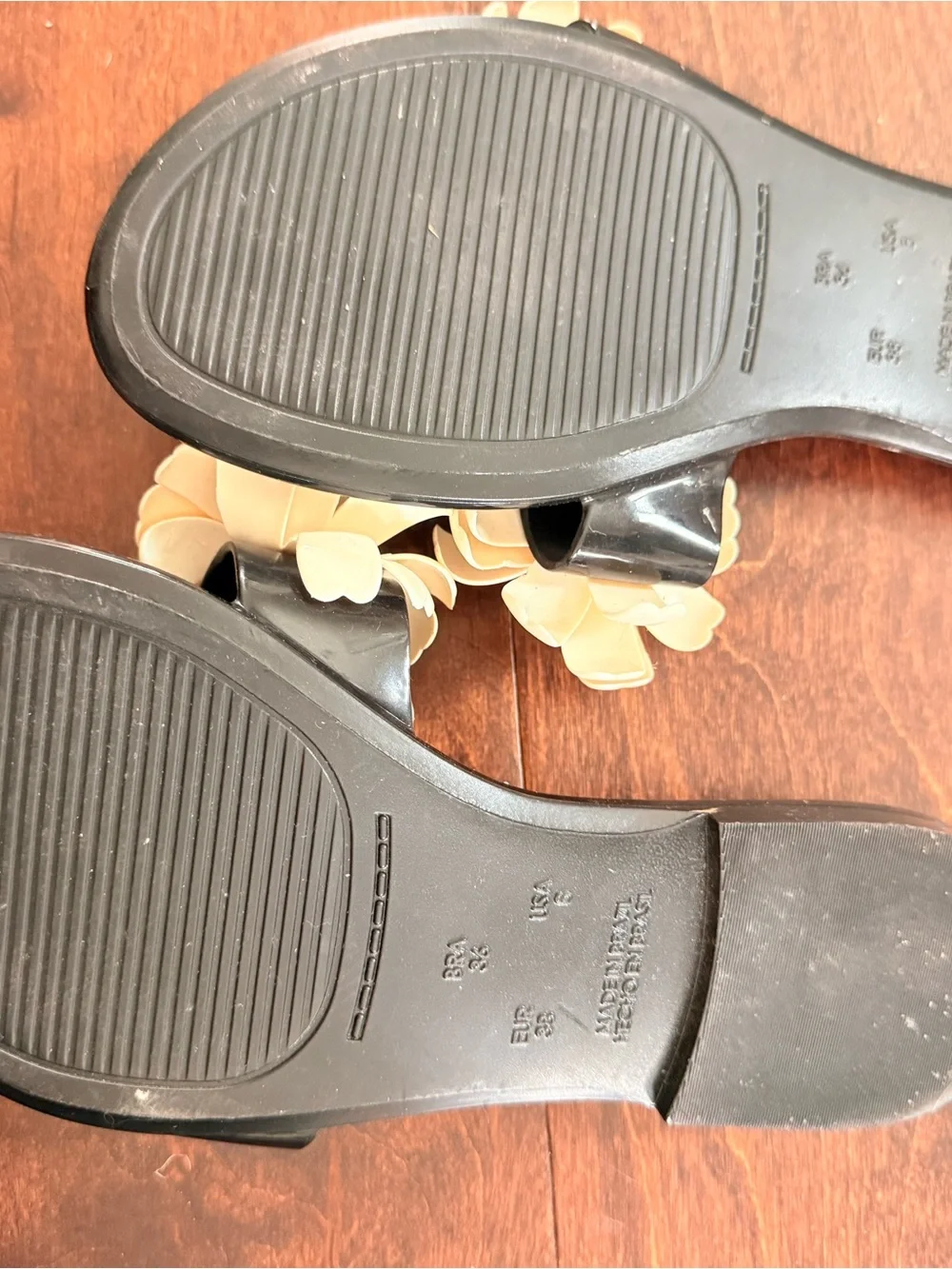 Sandal with floral embellishments